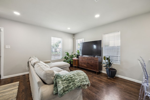 1215 Morrell Ave, Dallas, TX 75203 - living room with baseboards, dark wood-style flooring, and recessed lighting