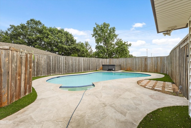 1646 Belltower Dr, Lewisville, TX 75067 - view of swimming pool with a fenced backyard, a patio, and an in-ground hot tub