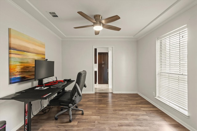 1646 Belltower Dr, Lewisville, TX 75067 - office with wood finished floors, ceiling fan, crown molding, and baseboards