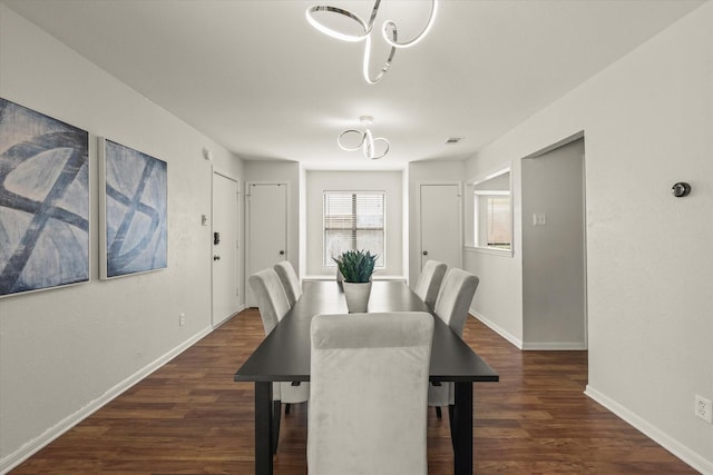 1646 Belltower Dr, Lewisville, TX 75067 - dining space featuring dark wood-style floors and baseboards