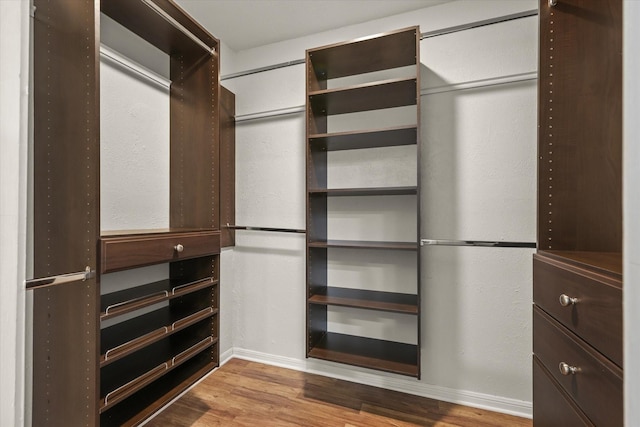 1646 Belltower Dr, Lewisville, TX 75067 - spacious closet with wood finished floors
