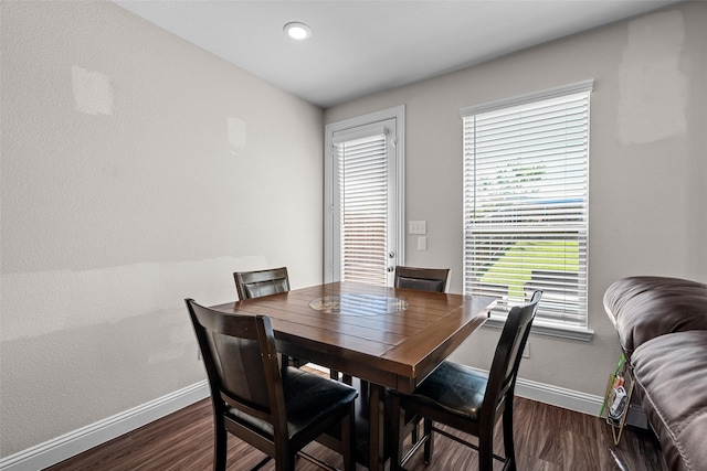 3657 Harebell Dr, Carrollton, TX 75007 - dining space featuring baseboards and dark wood-type flooring