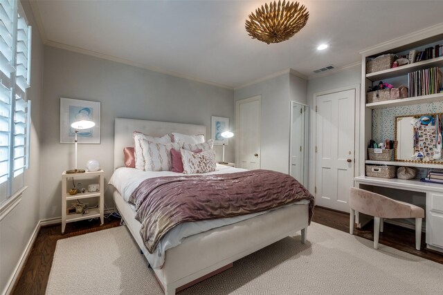 4560 Lorraine Ave, Highland Park, TX 75205 - bedroom with wood finished floors, ornamental molding, and baseboards