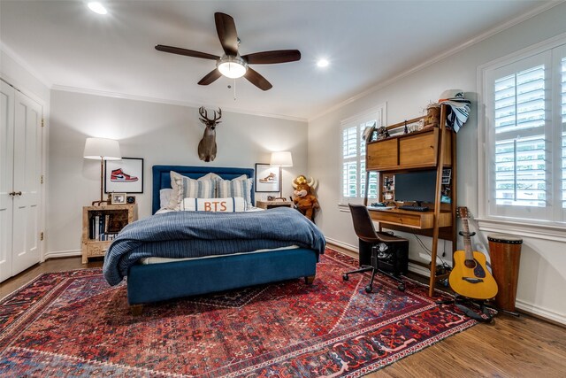 4560 Lorraine Ave, Highland Park, TX 75205 - bedroom featuring wood finished floors, multiple windows, crown molding, an office area, and recessed lighting