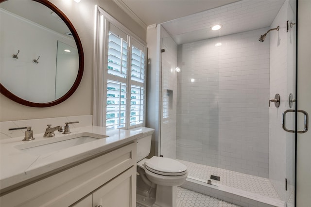 4560 Lorraine Ave, Highland Park, TX 75205 - full bath featuring vanity, a stall shower, crown molding, toilet, and tile patterned floors