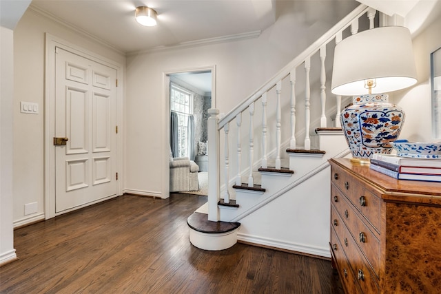 4560 Lorraine Ave, Highland Park, TX 75205 - foyer entrance with dark wood-style floors, stairway, crown molding, and baseboards