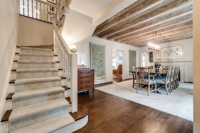 4560 Lorraine Ave, Highland Park, TX 75205 - dining area with wood finished floors, stairs, a chandelier, and beam ceiling