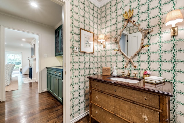 4560 Lorraine Ave, Highland Park, TX 75205 - bathroom with ornamental molding, vanity, wood finished floors, baseboards, and recessed lighting