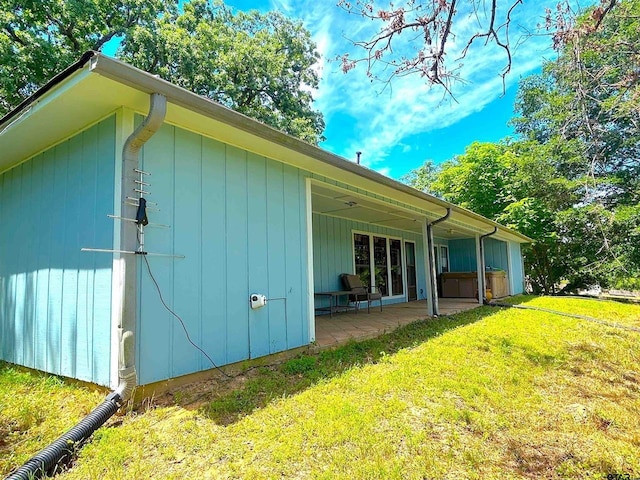 21363 Stevenson Rd, Frankston, TX 75763 - view of property exterior featuring a patio and a yard