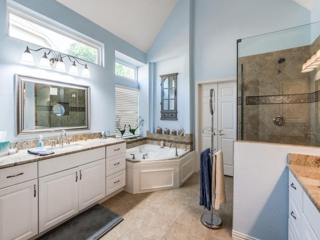 7805 Chapel View Dr, Mckinney, TX 75072 - full bathroom with vanity, a tile shower, a bath, and high vaulted ceiling
