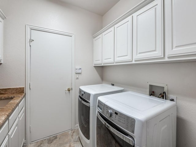 7805 Chapel View Dr, Mckinney, TX 75072 - laundry room featuring cabinet space, washing machine and clothes dryer, and light stone finish flooring
