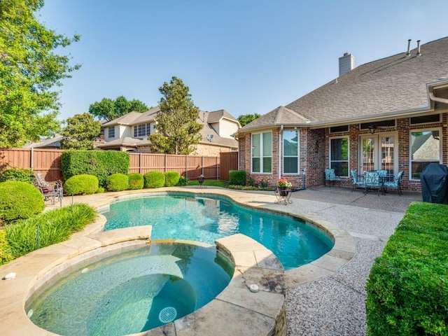 7805 Chapel View Dr, Mckinney, TX 75072 - view of swimming pool featuring a patio, a grill, a fenced backyard, and a pool with connected hot tub