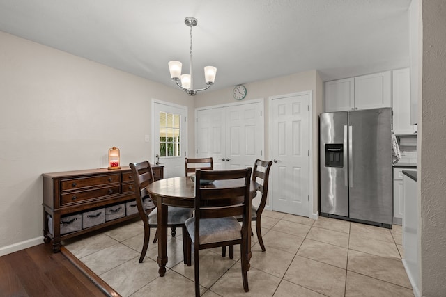 7201 Winchester Rd, North Richland Hills, TX 76182 - dining area with a chandelier and baseboards