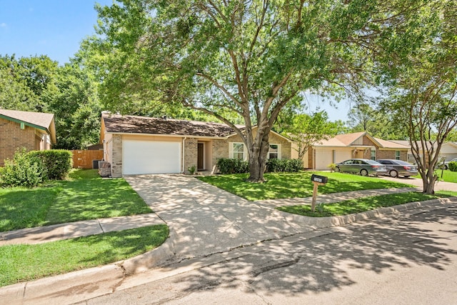 7201 Winchester Rd, North Richland Hills, TX 76182 - view of front facade featuring driveway, an attached garage, brick siding, and central AC unit