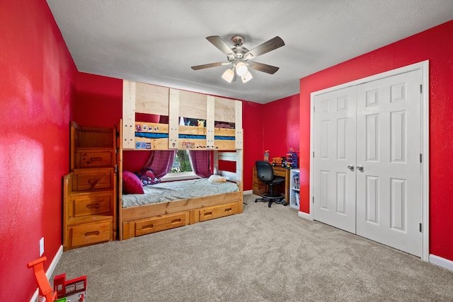 7201 Winchester Rd, North Richland Hills, TX 76182 - carpeted bedroom featuring baseboards, ceiling fan, and a closet