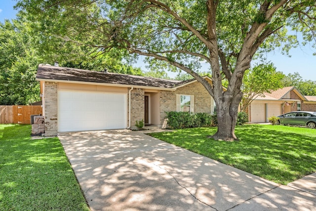 7201 Winchester Rd, North Richland Hills, TX 76182 - view of front of property with driveway, brick siding, and an attached garage