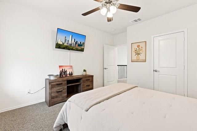 11216 Ponderosa Trl, Aubrey, TX 76227 - bedroom featuring carpet flooring, baseboards, and ceiling fan