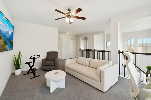 11216 Ponderosa Trl, Aubrey, TX 76227 - living area with ceiling fan, carpet flooring, baseboards, and recessed lighting
