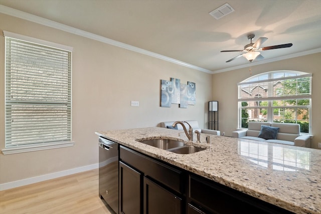 4708 River Edge Pl, Frisco, TX 75036 - kitchen featuring a sink, dishwasher, baseboards, light wood finished floors, and ornamental molding