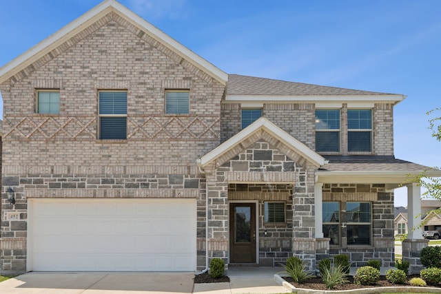 452 Ella Ln, Fate, TX 75087 - view of front facade with driveway, a garage, and roof with shingles