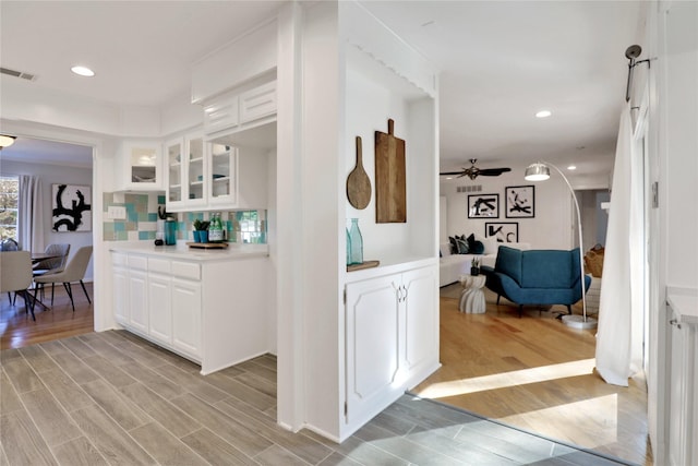 205 N College St, Mckinney, TX 75069 - bar with light wood finished floors, decorative backsplash, recessed lighting, and ceiling fan
