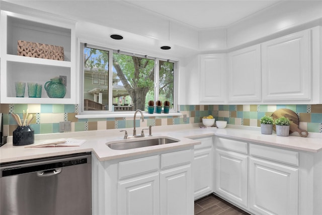 205 N College St, Mckinney, TX 75069 - kitchen with dishwasher, a sink, white cabinetry, backsplash, and light countertops