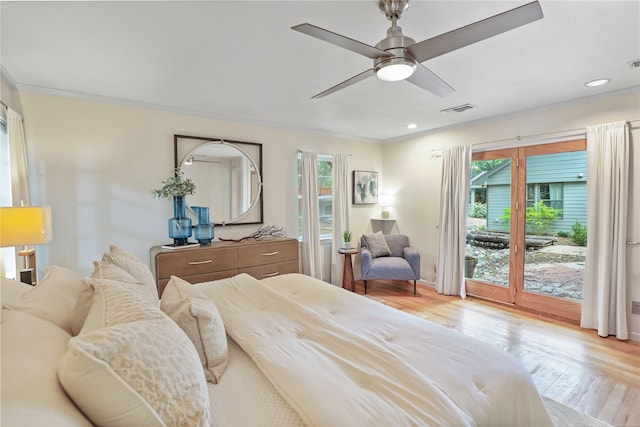 205 N College St, Mckinney, TX 75069 - bedroom with multiple windows, access to outside, ornamental molding, wood finished floors, and recessed lighting