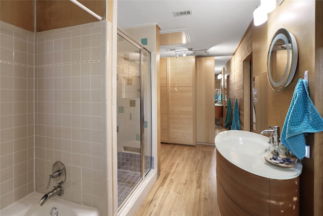 205 N College St, Mckinney, TX 75069 - full bathroom featuring wood finished floors and vanity