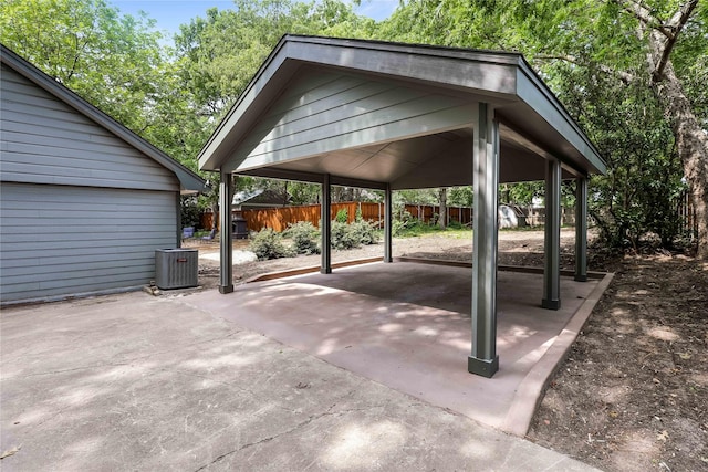 205 N College St, Mckinney, TX 75069 - view of vehicle parking featuring a carport