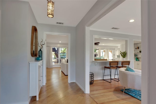 205 N College St, Mckinney, TX 75069 - hallway featuring light wood-style floors, baseboards, and recessed lighting