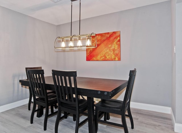 2908 Longfellow Ln, Denton, TX 76209 - dining space featuring light wood-style flooring and baseboards