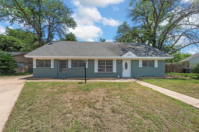 3412 Lisbon Dr, Waco, TX 76706 - view of front of house with brick siding and a shingled roof