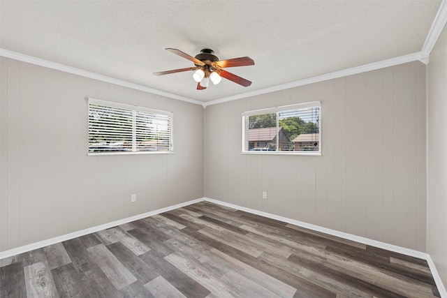 3412 Lisbon Dr, Waco, TX 76706 - spare room featuring plenty of natural light, wood finished floors, a ceiling fan, ornamental molding, and a textured ceiling