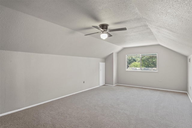 3412 Lisbon Dr, Waco, TX 76706 - additional living space featuring vaulted ceiling, carpet floors, a textured ceiling, ceiling fan, and baseboards