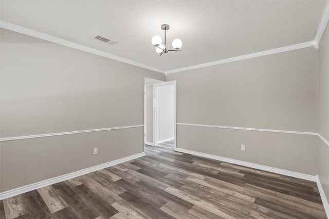 3412 Lisbon Dr, Waco, TX 76706 - unfurnished room with a chandelier, wood finished floors, ornamental molding, and baseboards