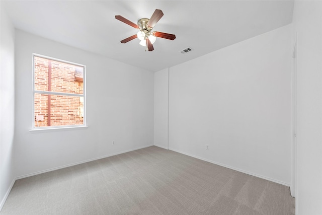 2442 Mackinac Dr, Frisco, TX 75033 - empty room with light carpet, ceiling fan, and baseboards