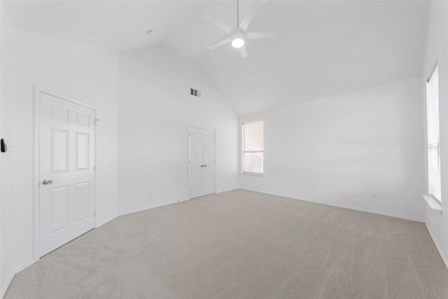 2442 Mackinac Dr, Frisco, TX 75033 - spare room with a ceiling fan, high vaulted ceiling, carpet floors, and baseboards