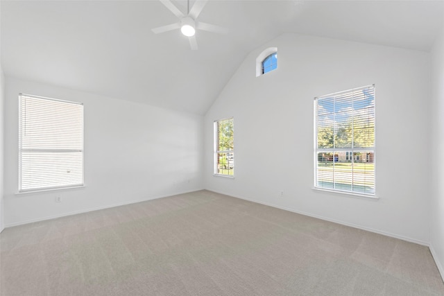 2442 Mackinac Dr, Frisco, TX 75033 - spare room featuring a ceiling fan, light colored carpet, high vaulted ceiling, and baseboards