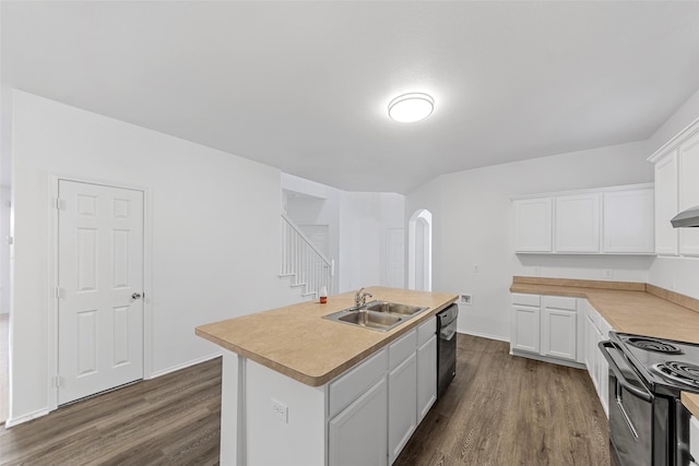 2442 Mackinac Dr, Frisco, TX 75033 - kitchen featuring a sink, black appliances, arched walkways, and dark wood-style flooring