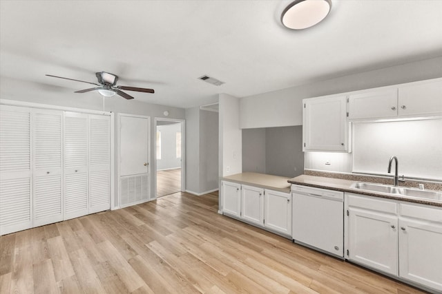 603 Plainview Dr, Mansfield, TX 76063 - kitchen featuring white dishwasher, a sink, ceiling fan, white cabinetry, and light wood-type flooring