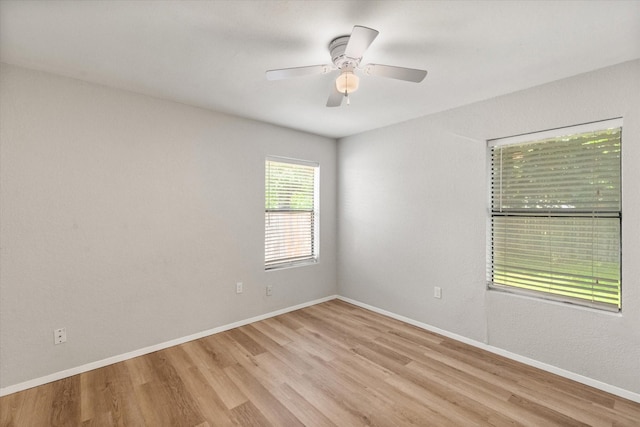 603 Plainview Dr, Mansfield, TX 76063 - empty room featuring light wood-style floors, baseboards, and ceiling fan