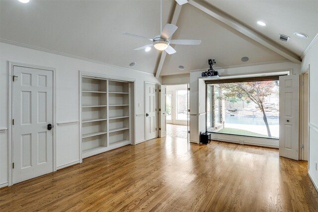18602 Turnbridge Dr, Dallas, TX 75252 - unfurnished living room featuring a ceiling fan, wood finished floors, built in features, a baseboard heating unit, and crown molding