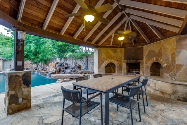 18602 Turnbridge Dr, Dallas, TX 75252 - view of patio with an outdoor stone fireplace, ceiling fan, a gazebo, and outdoor dining area