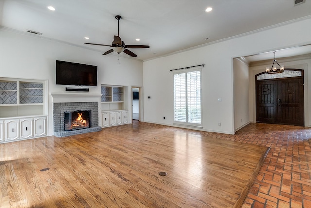 18602 Turnbridge Dr, Dallas, TX 75252 - unfurnished living room featuring crown molding, baseboards, recessed lighting, ceiling fan, and a fireplace
