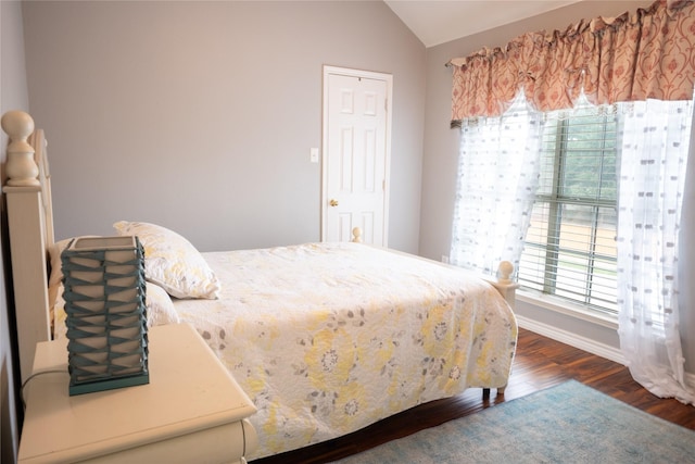 1421 Eugene Dr, Wylie, TX 75098 - bedroom with vaulted ceiling, wood finished floors, and baseboards