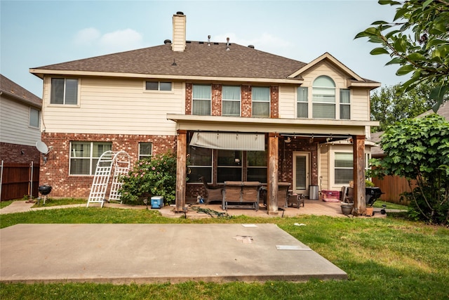 1421 Eugene Dr, Wylie, TX 75098 - rear view of property featuring brick siding, a patio, a chimney, and roof with shingles