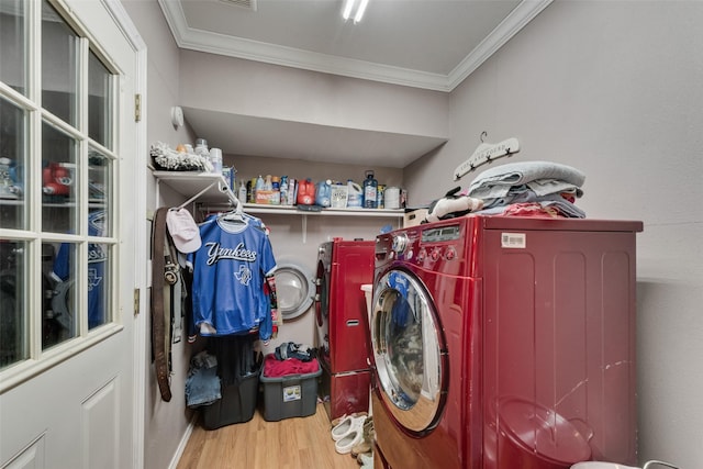 2900 Lachelle Ln, Arlington, TX 76010 - laundry room with independent washer and dryer, wood finished floors, and crown molding