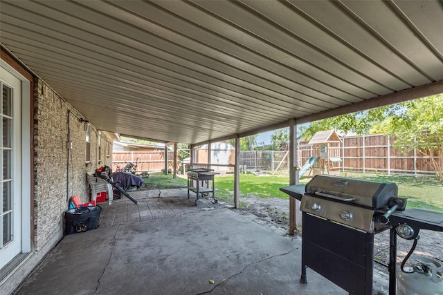 2900 Lachelle Ln, Arlington, TX 76010 - view of patio / terrace featuring a playground and grilling area