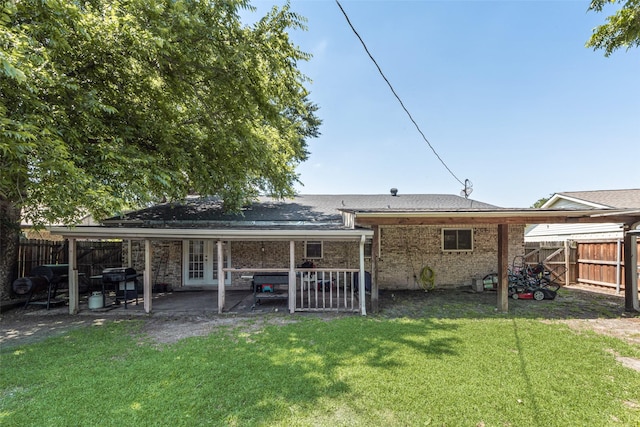 2900 Lachelle Ln, Arlington, TX 76010 - rear view of house with french doors, a patio, and brick siding