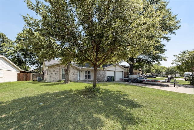 2900 Lachelle Ln, Arlington, TX 76010 - view of front of home featuring an attached garage, driveway, brick siding, and central AC unit